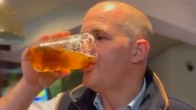 <p>Tory MP downs pint as he sums up what national service is: ‘One pint, one policy’.</p>