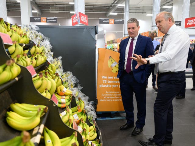 <p>Keir Starmer checking out the banana selection in Sainsbury’s</p>