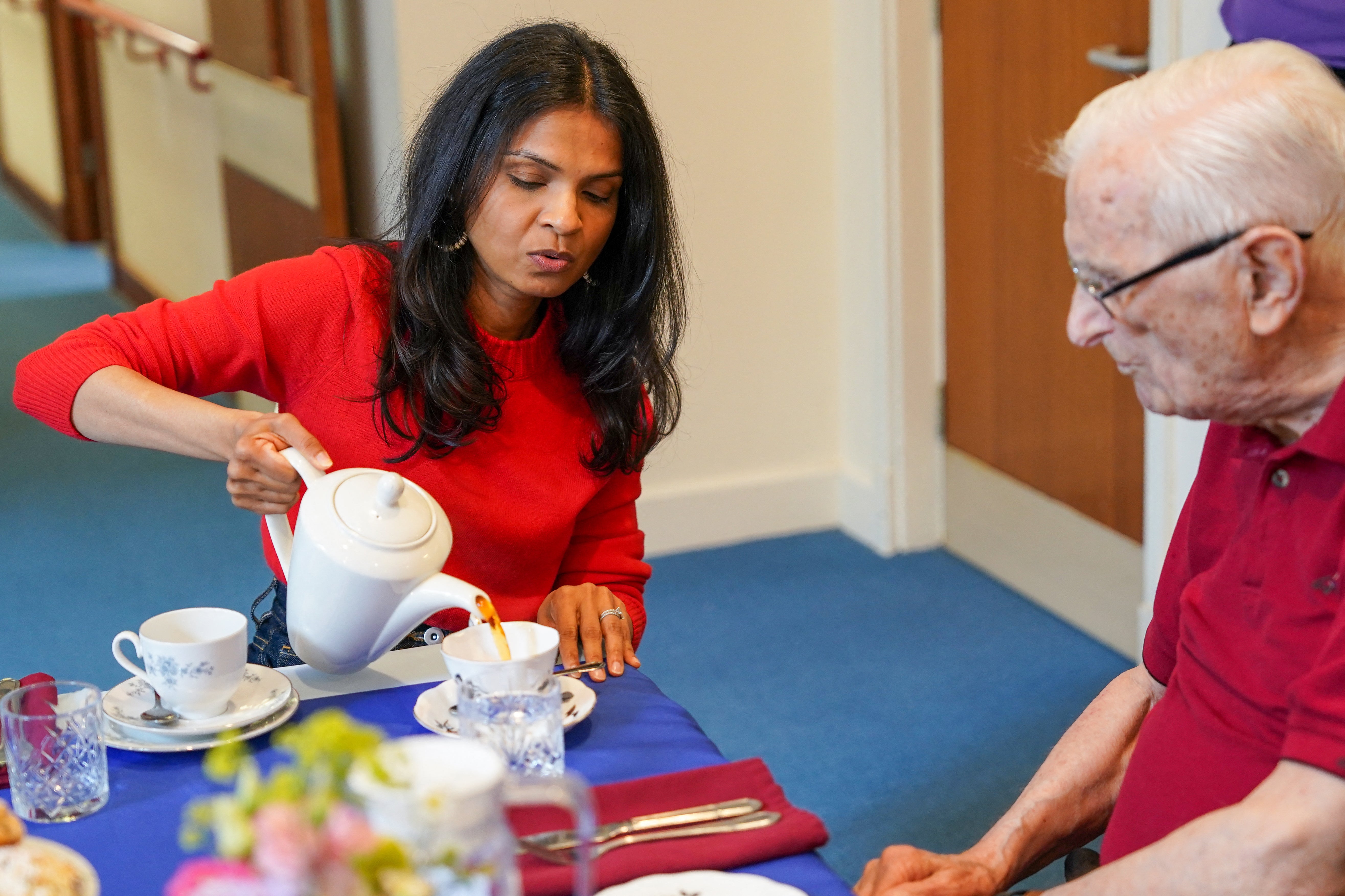 Rishi Sunak’s wife, Akshata Murty, meets residents at a Royal British Legion care home in Ripon on Wednesday