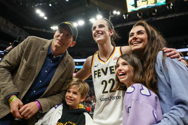 <p>Caitlin Clark of the Indiana Fever poses for a photo with Ashton Kutcher and Mila Kunis with daughter Wyatt and son Dimitri</p>