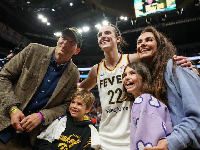 <p>Caitlin Clark of the Indiana Fever poses for a photo with Ashton Kutcher and Mila Kunis with daughter Wyatt and son Dimitri</p>