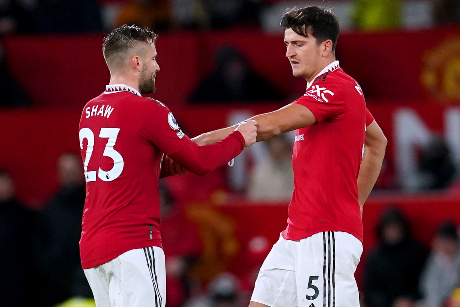 Luke Shaw (left) and Harry Maguire have joined up early with England (Nick Potts/PA)