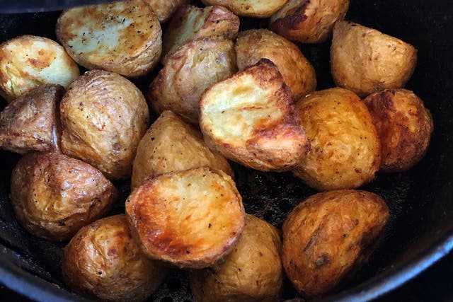 <p>Crispy roasted potatoes seasoned with rosemary and garlic, fresh out of the air fryer</p>