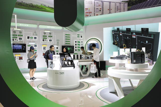 <p>A view of the booth of Schneider Electric SE during an expo in Shanghai</p>
