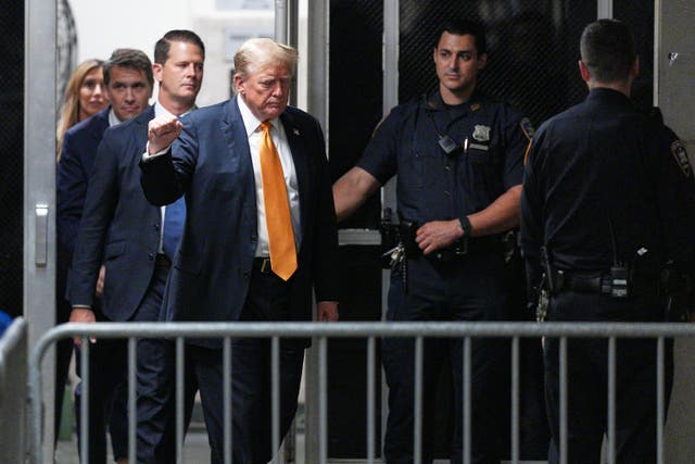 Former U.S. President Donald Trump returns from a break to his criminal trial at Manhattan Criminal Court on May 29