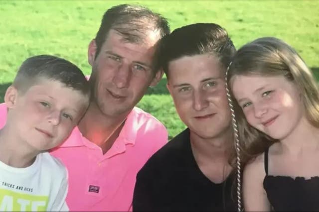 <p>Scott Hendy surrounded by his children Harvey, Lewis and Holly</p>