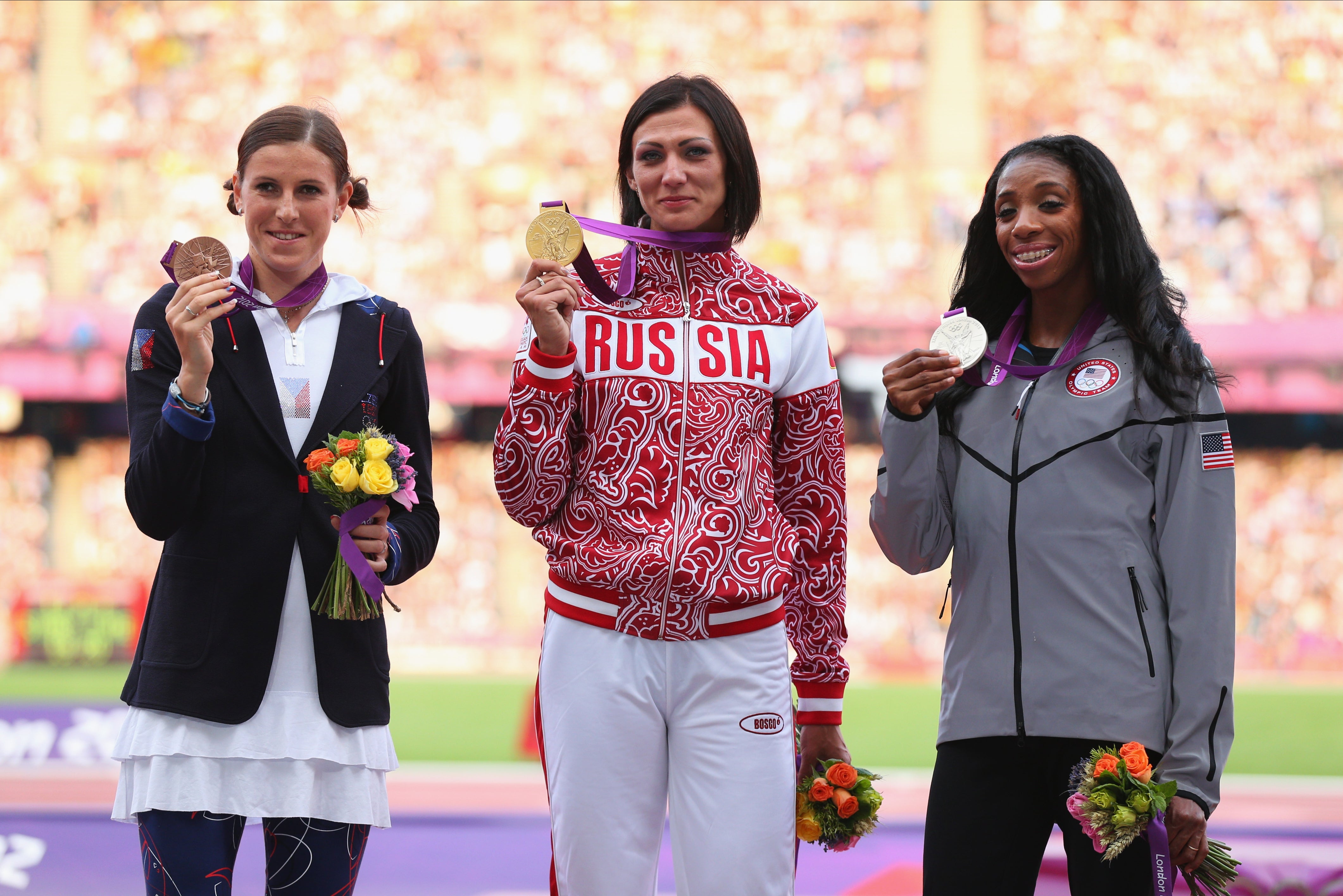 Lashinda Demus (right) is set to receive her gold medal