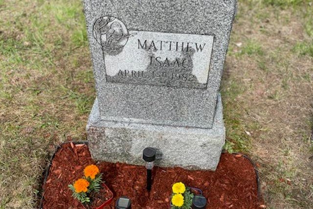 <p>Police share the gravestone of Matthew Isaac Doe, burried in 1982 after his infant body was found by a roadway </p>
