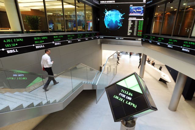 London’s FTSE 100 has clawed back some of its losses from a downbeat week (Nick Ansell/PA)