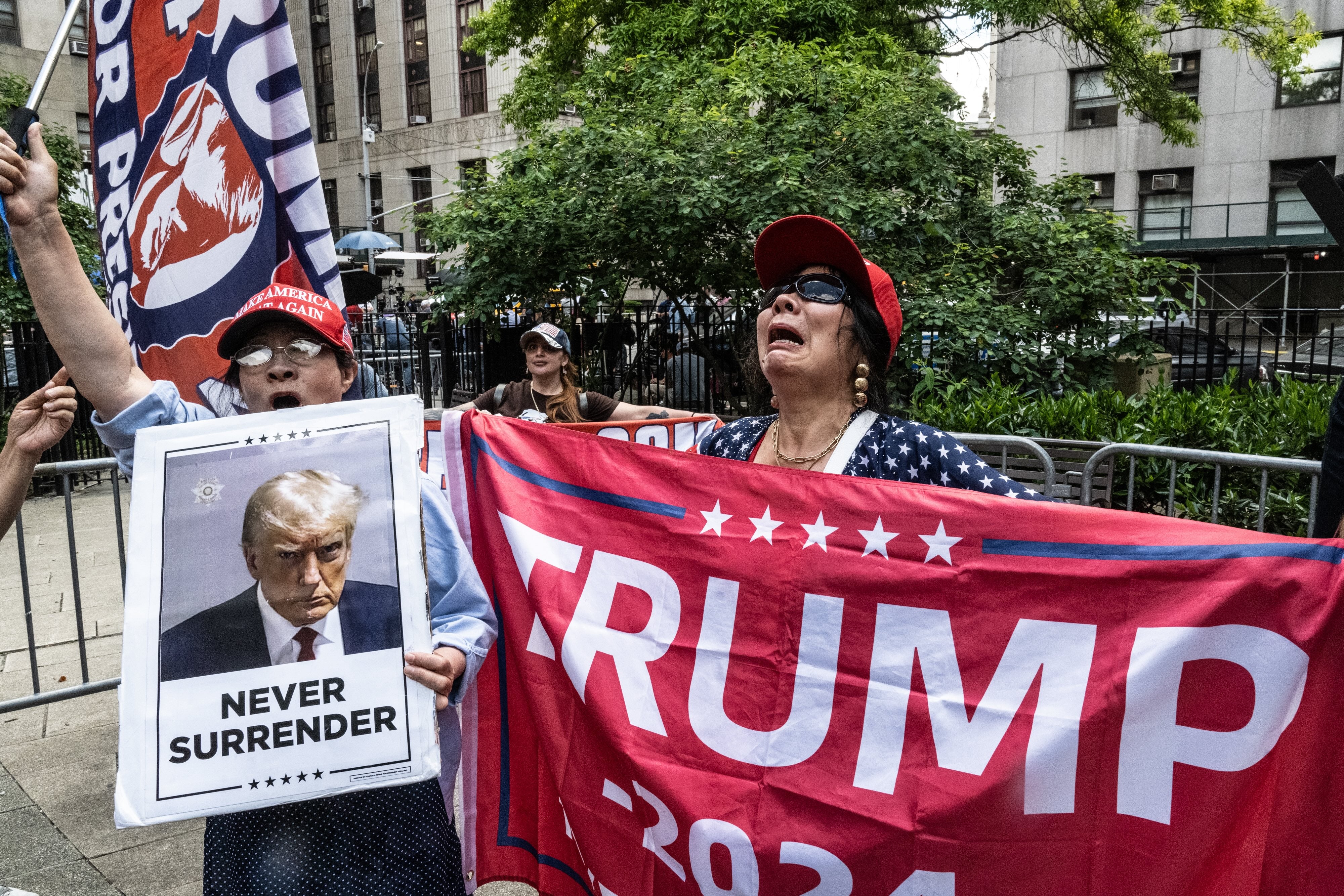 Trump supporters rally outside the criminal court where former President Donald Trump is on trial on May 29, 2024 in New York City.