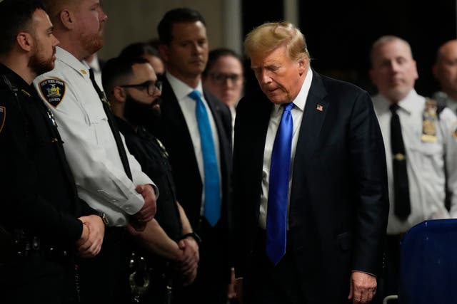 Former U.S. President Donald Trump walks to speak to the media after being found guilty following his hush money trial at Manhattan Criminal Court on May 30, 2024 in New York City