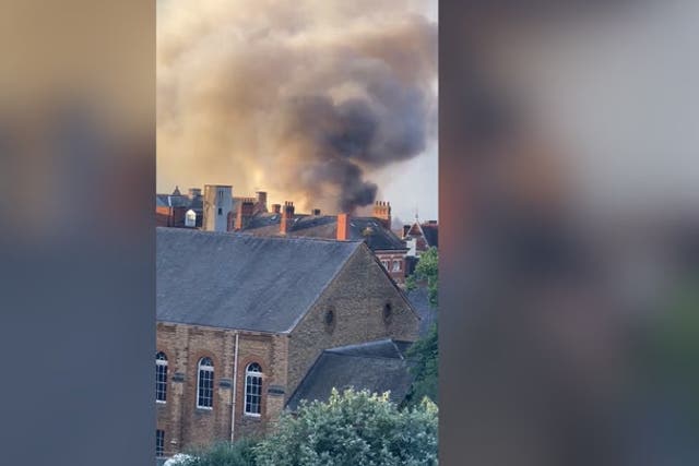 <p>Thick black smoke billows across Northampton town centre as crews battle ‘large-scale’ fire.</p>