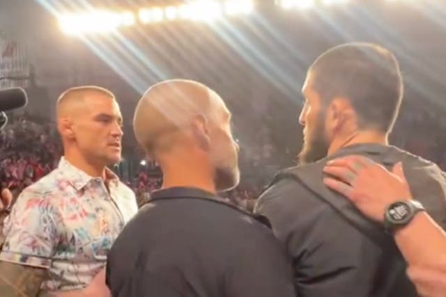 <p>Dustin Poirier (left) and Islam Makhachev argue at the UFC 302 press conference</p>