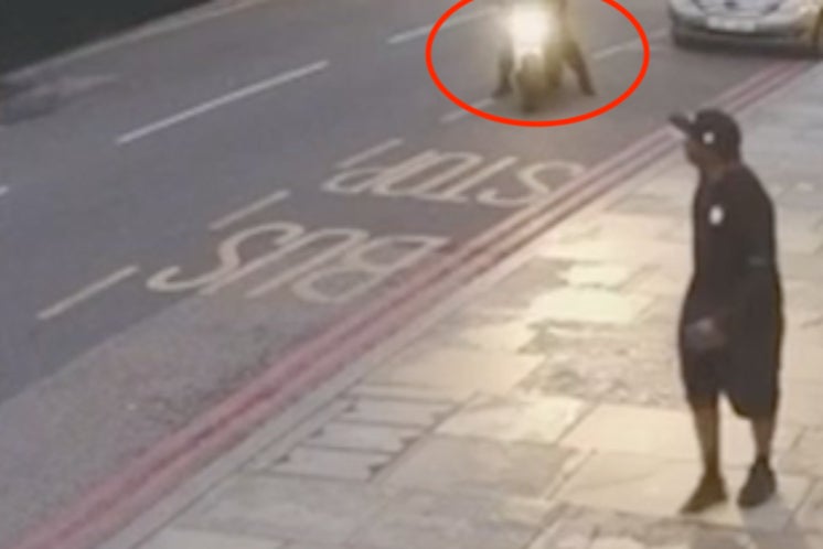 CCTV image shows the moment a motorcyclist launched the attack