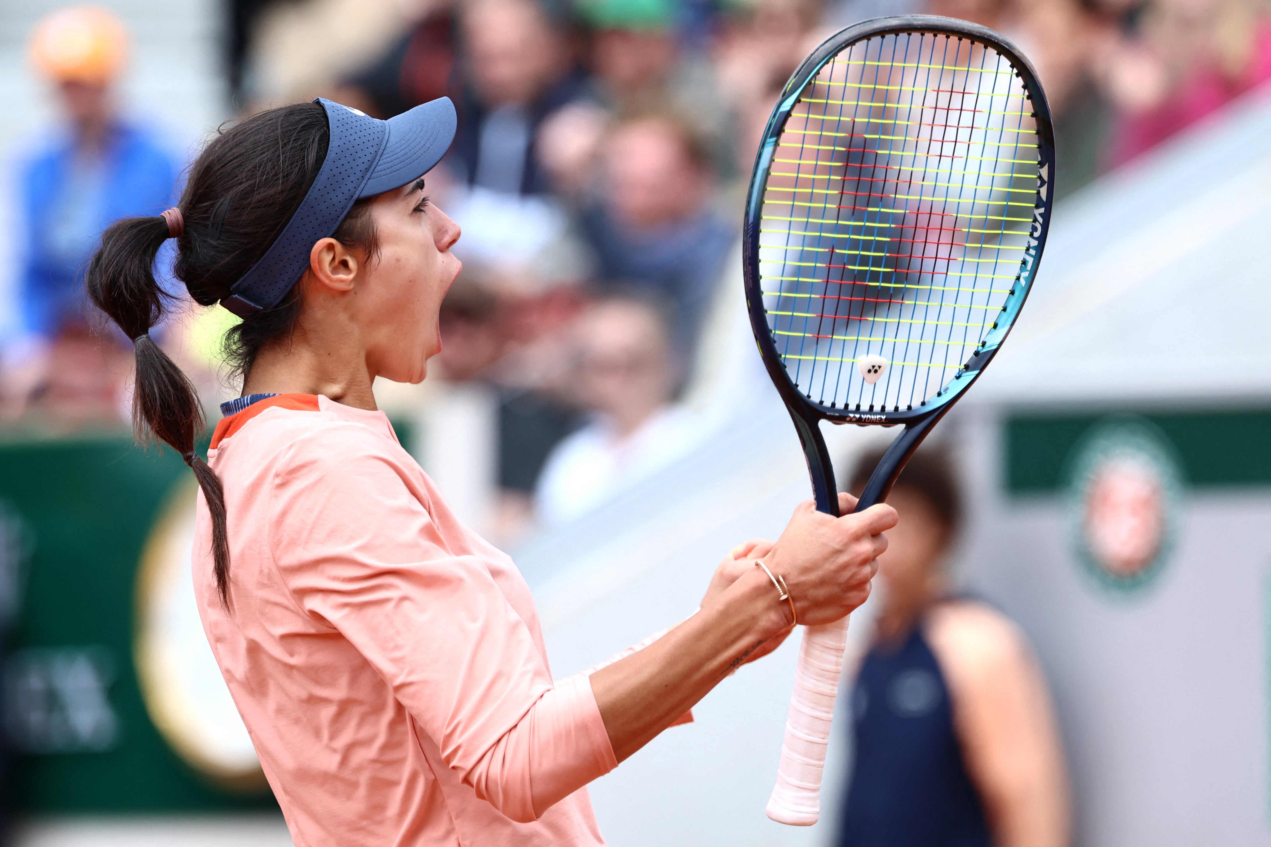 Serbia's Olga Danilovic celebrates winning the second set