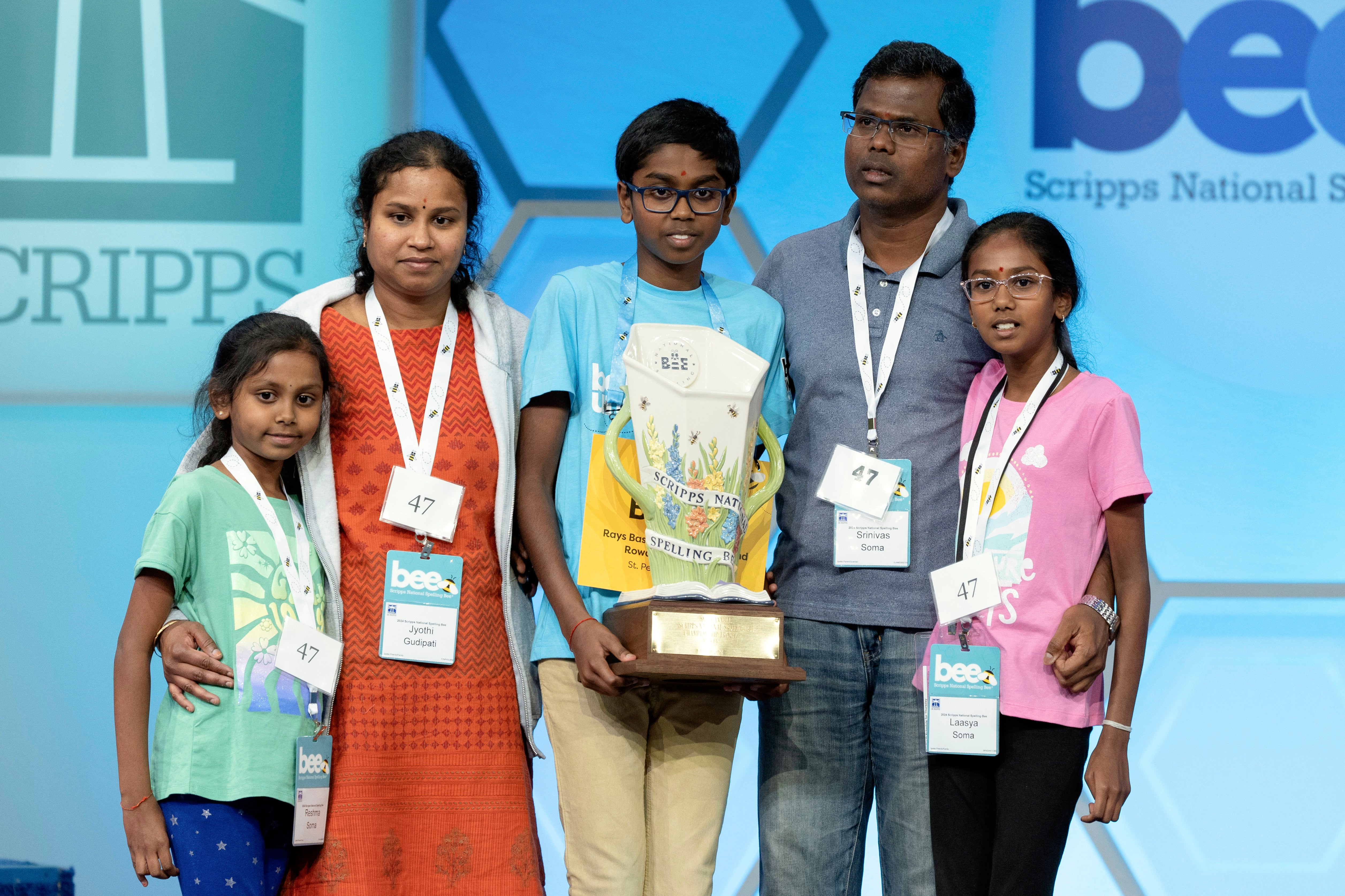 Bruhat with his family after winning the Scripps National Spelling Bee