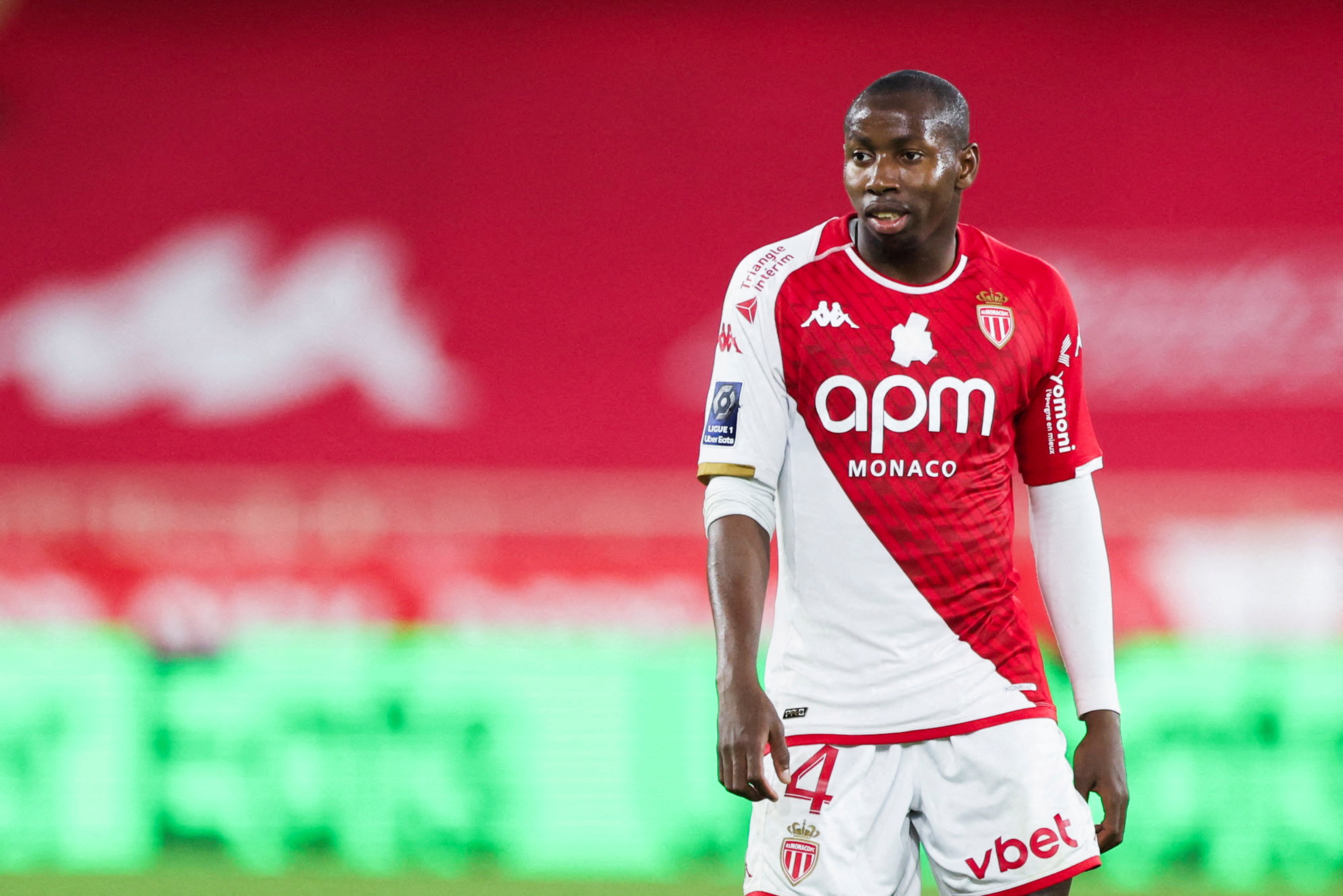 Monaco’s Mohamed Camara wears a shirt with a LGBTQ+ rainbow covered up