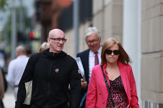 Lyra McKee’s sister, Nichola Corner, and her husband, John Corner, arrive at Laganside Court (Liam McBurney/PA)