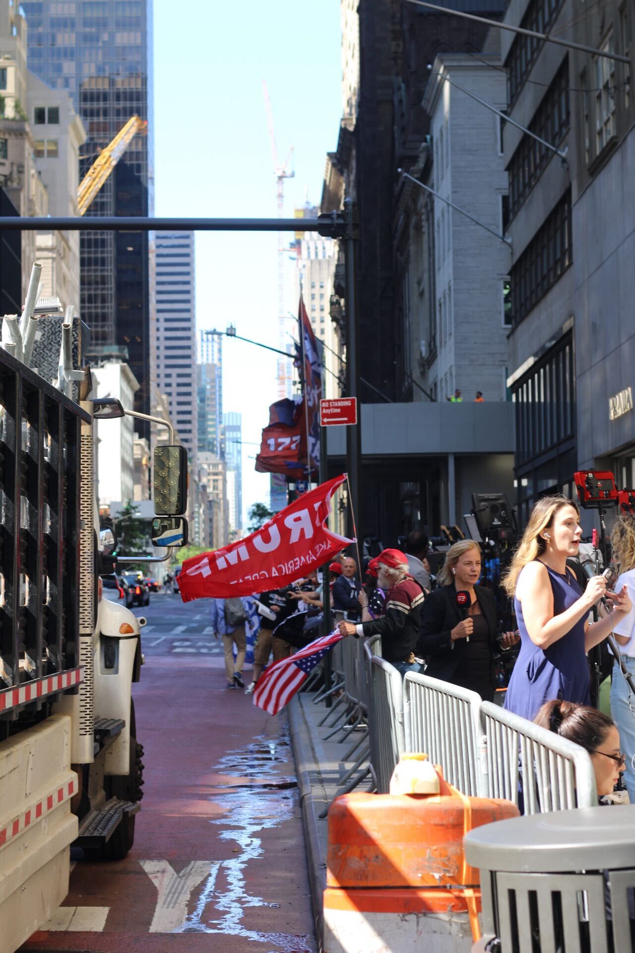 Reporters and Trump supporters stand outside Trump Tower ahead of Donald Trump’s press conference on Friday 31 May