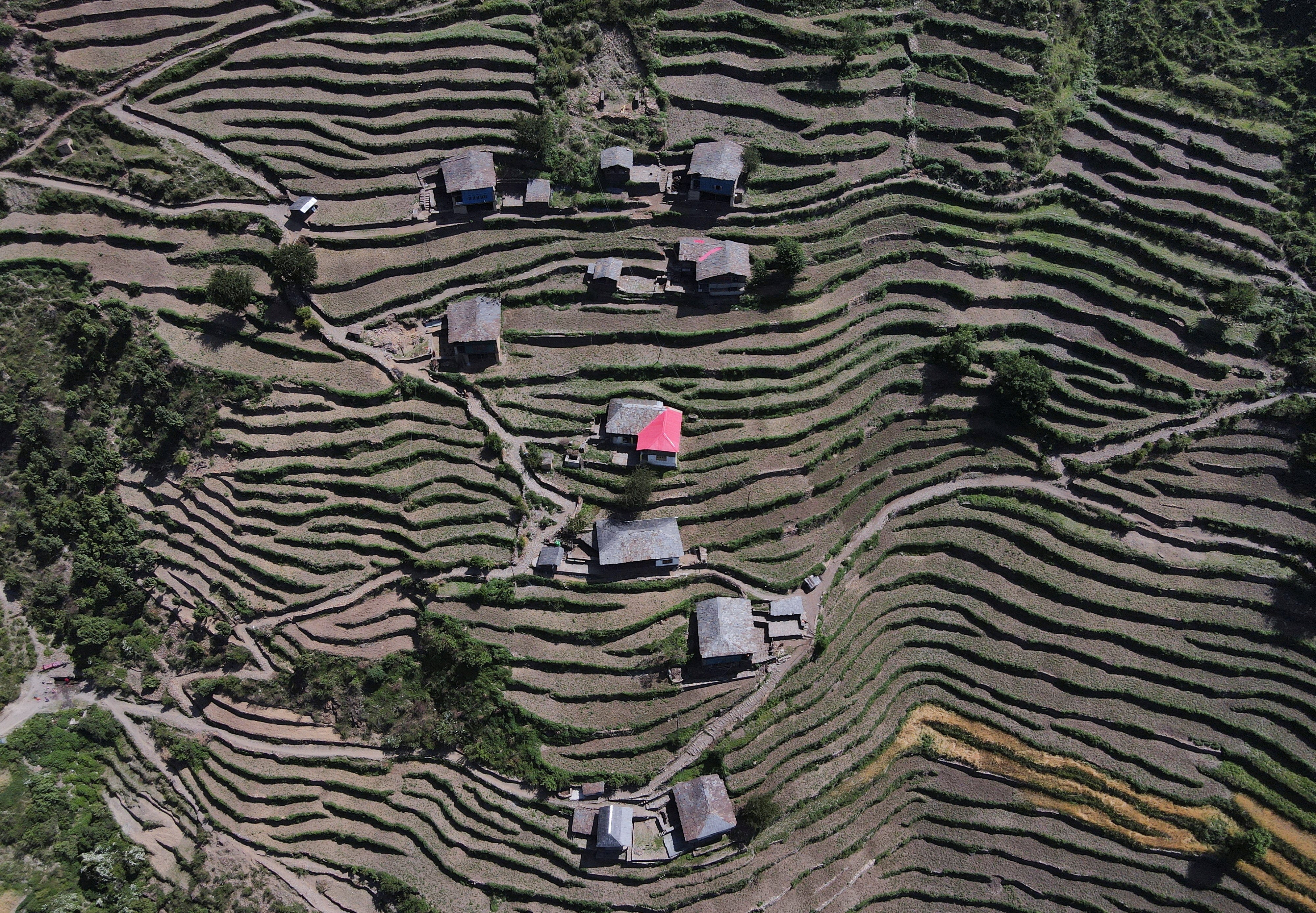 A drone view shows houses in Almi, the village hosting a remote polling station, ahead of the seventh and final phase of the general election