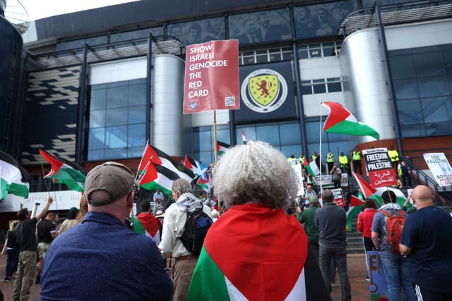 <p>Protesters arrive at Hampden Park where Scotland Women face Israel in a Euro 2025 qualifier.</p>