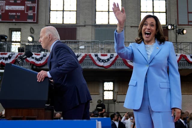 President Joe Biden speaks as Vice President Kamala Harris waves at a campaign event at Girard College in Philadelphia