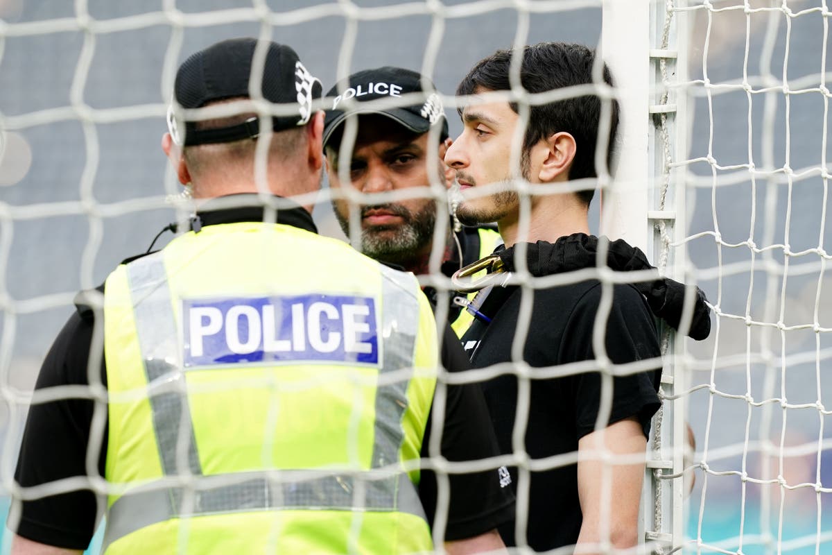 Protester ties himself to Hampden goalpost to delay Scotland-Israel football match