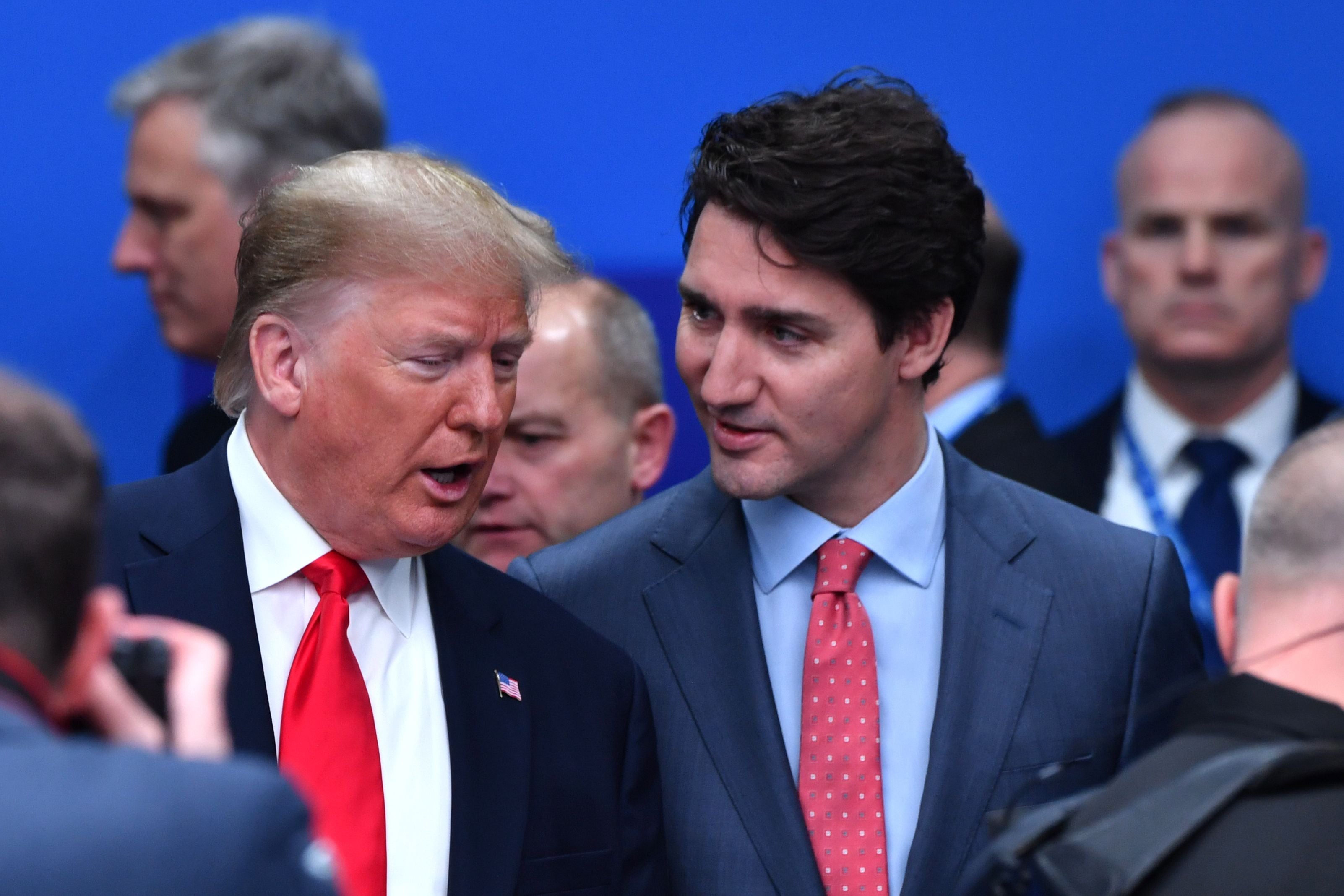 Then-president Donald Trump talks with Canada’s Prime Minister Justin Trudeau during the plenary session of the NATO summit in 2019