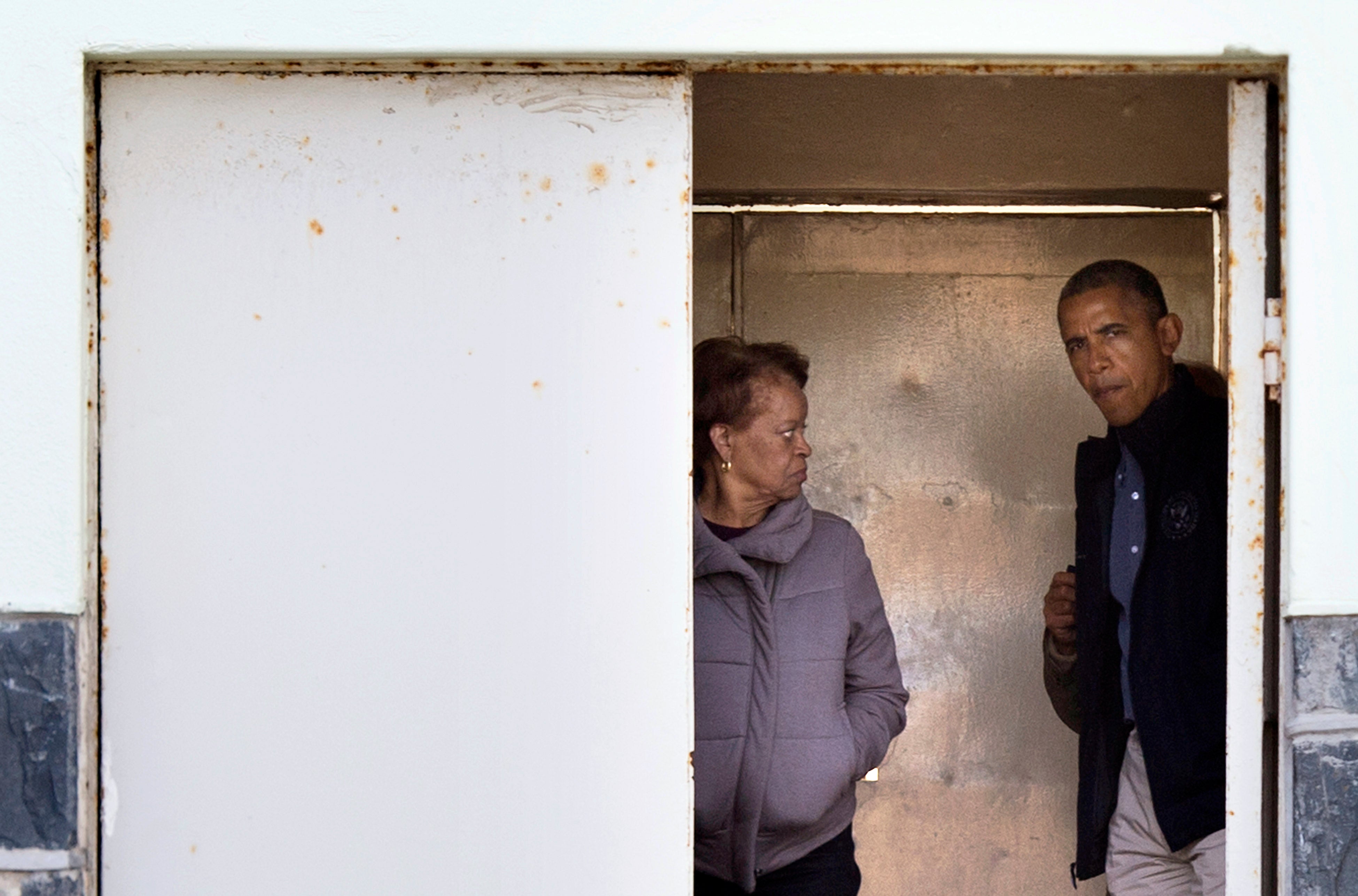 Barack Obama and Marian Robinson arrive June 30, 2013 for a tour of Robben Island, where South African anti-apartheid activist Nelson Mandela was imprisoned.