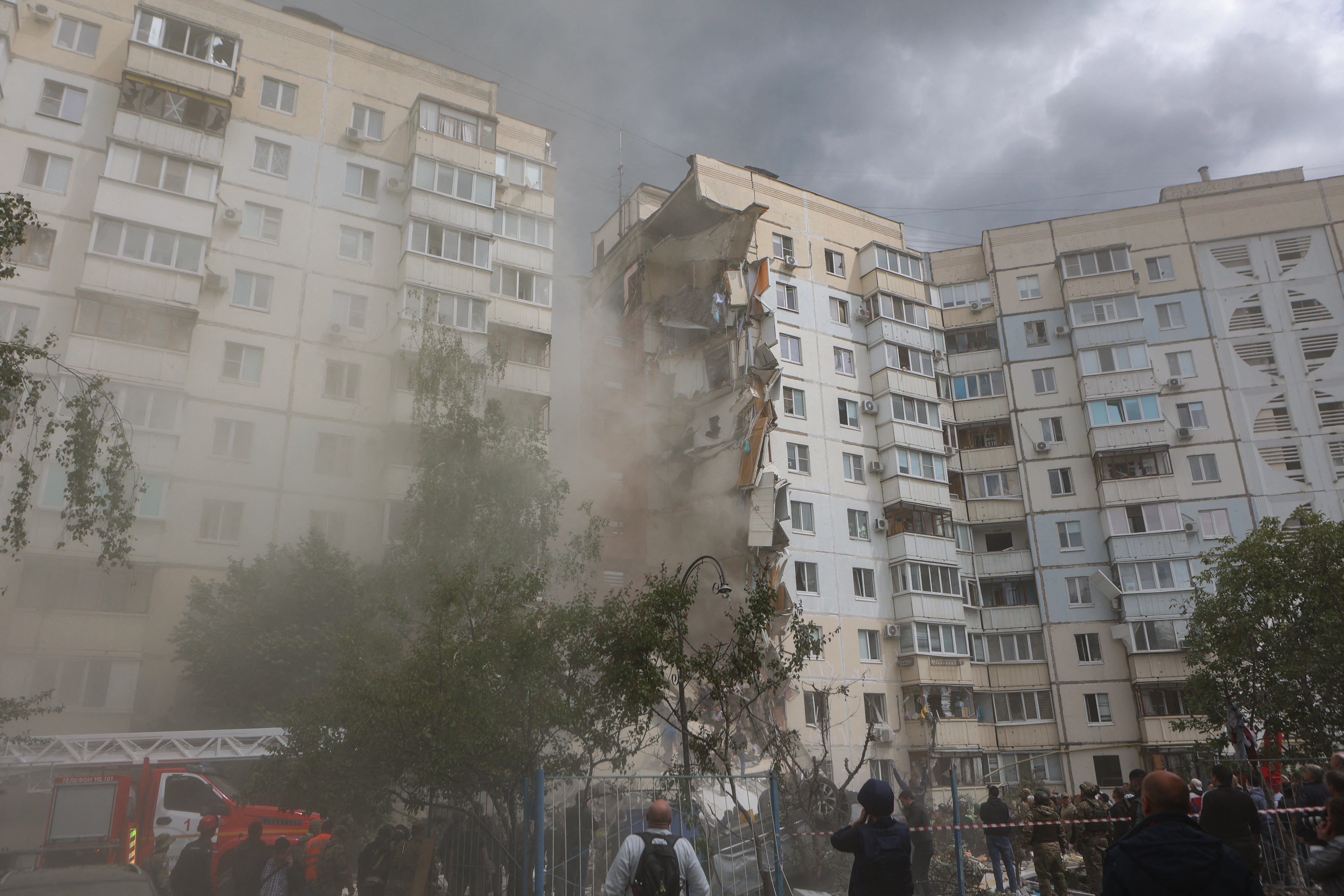 This photograph shows a view of a partially collapsed apartment building which was damaged by a Ukrainian strike in Belgorod on 12 May 2024
