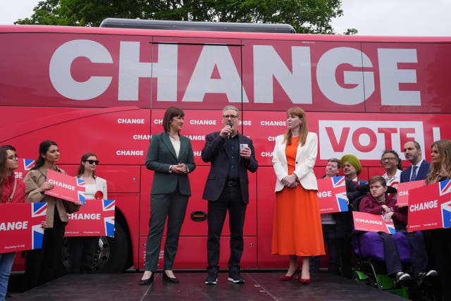 <p>Shadow chancellor Rachel Reeves, Labour Party leader Sir Keir Starmer and deputy Labour leader Angela Rayner, at the launch event for Labour’s campaign bus in Uxbridge (Lucy North/PA)</p>