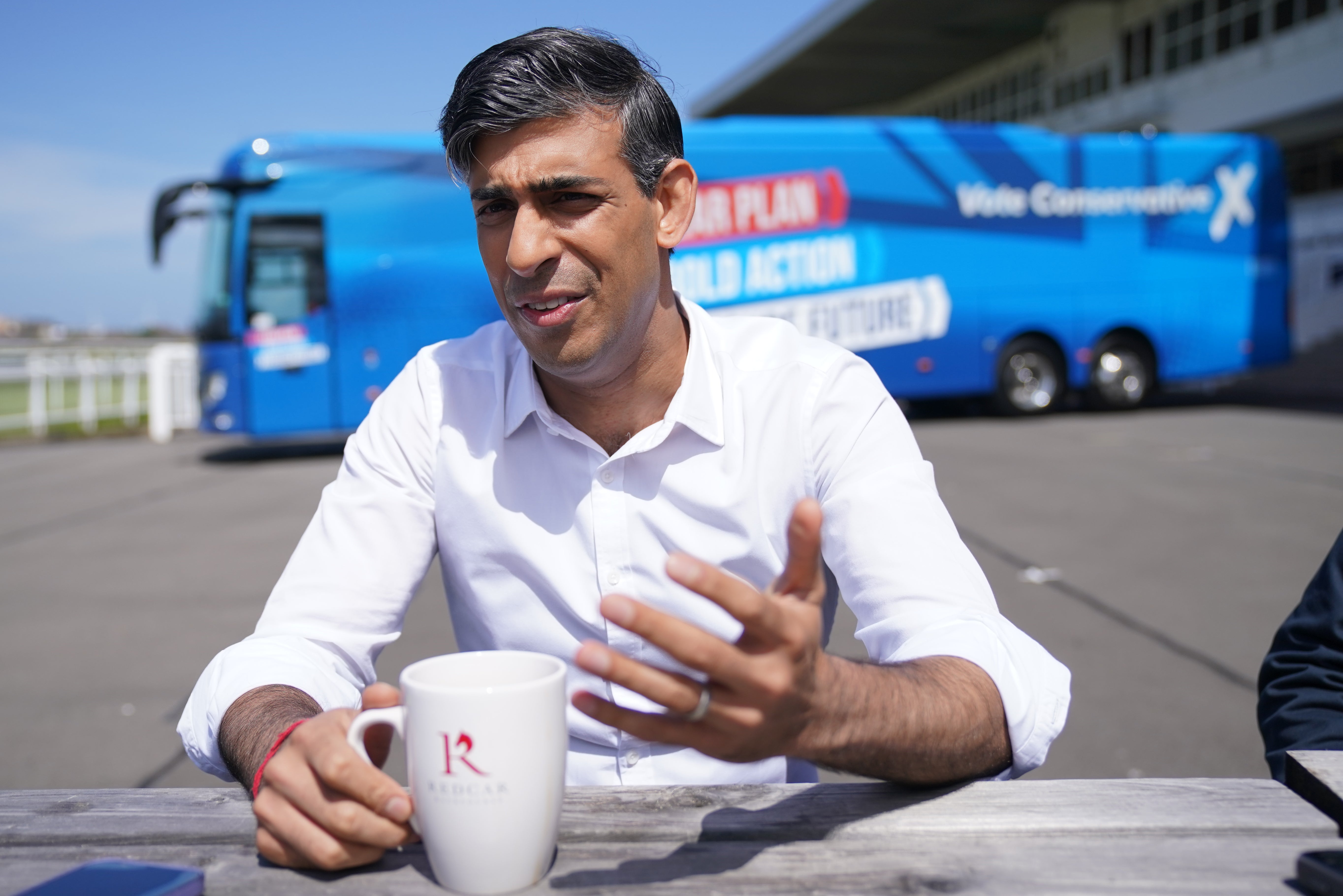 Rishi Sunak speaks to the media at the launch of the Conservative campaign bus at Redcar Racecourse