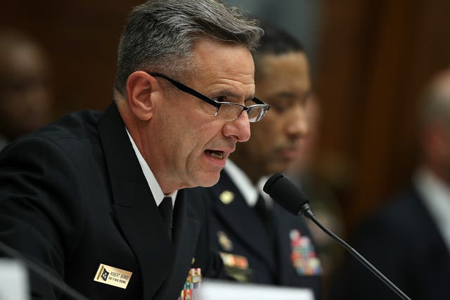<p>Admiral Robert Burke, pictured in 2017, has been charged with conspiracy to commit bribery and bribery by the US Department of Justice</p>