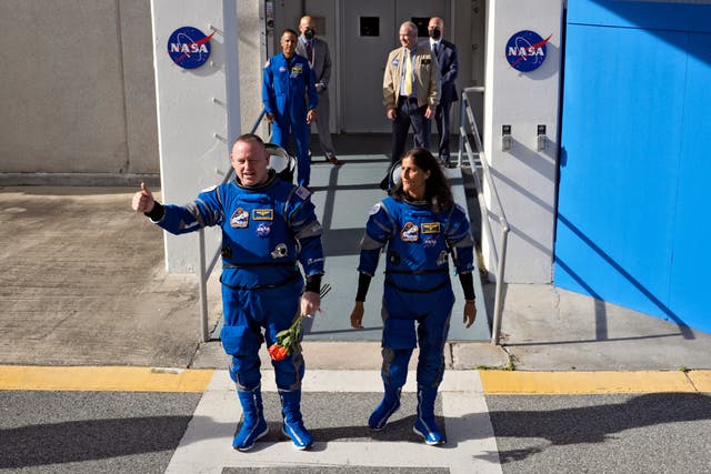 <p>NASA astronauts Butch Wilmore, left, and Suni Williams leave the operations and checkout building for a trip to launch pad at Space Launch Complex 41 Saturday, June 1, 2024, in Cape Canaveral, Florida</p>