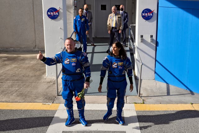 <p>NASA astronauts Butch Wilmore, left, and Suni Williams leave the operations and checkout building for a trip to launch pad at Space Launch Complex 41 Saturday, June 1, 2024, in Cape Canaveral, Florida</p>