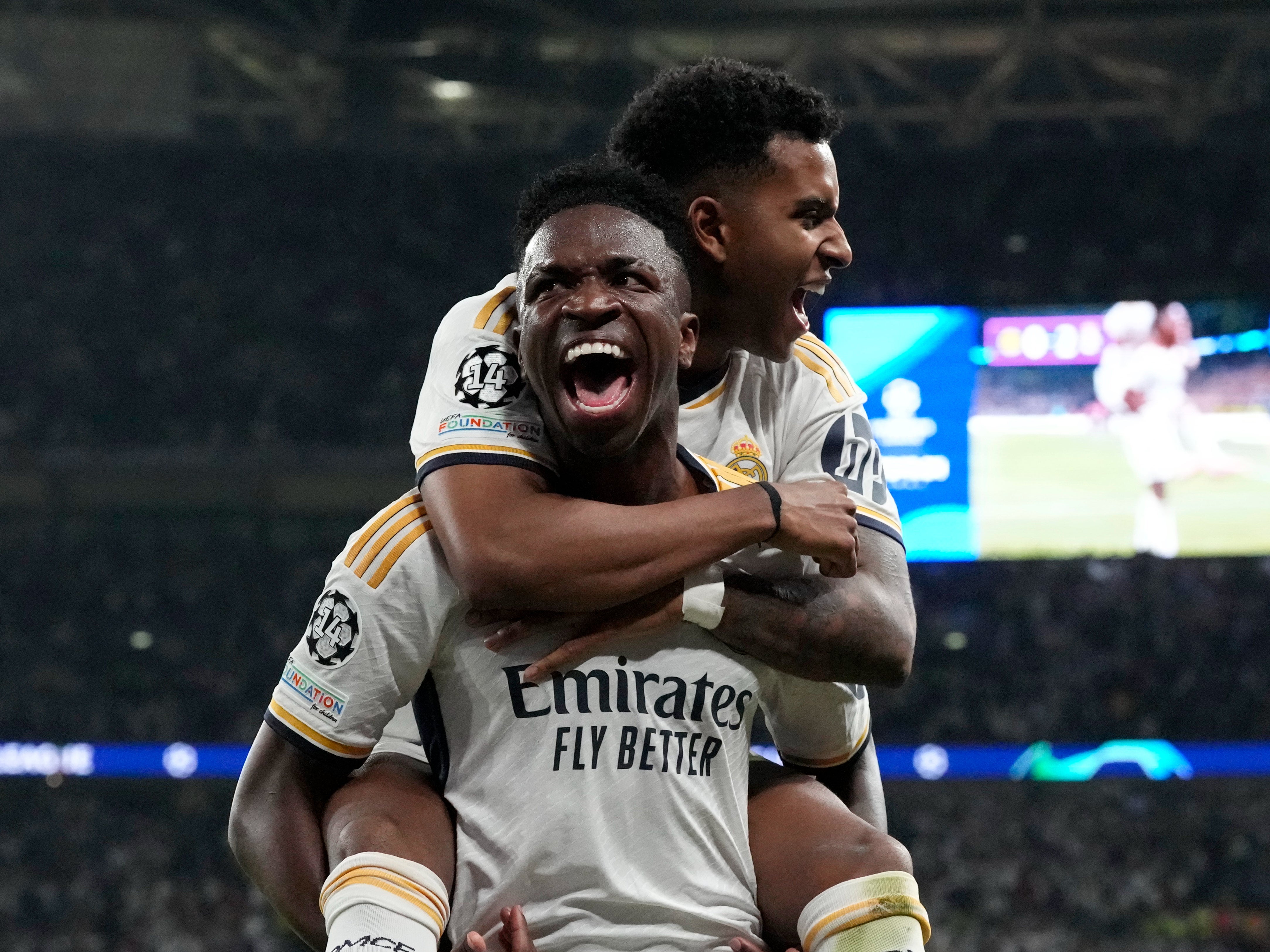 Real Madrid's Vinicius Junior celebrates with Rodrygo after scoring