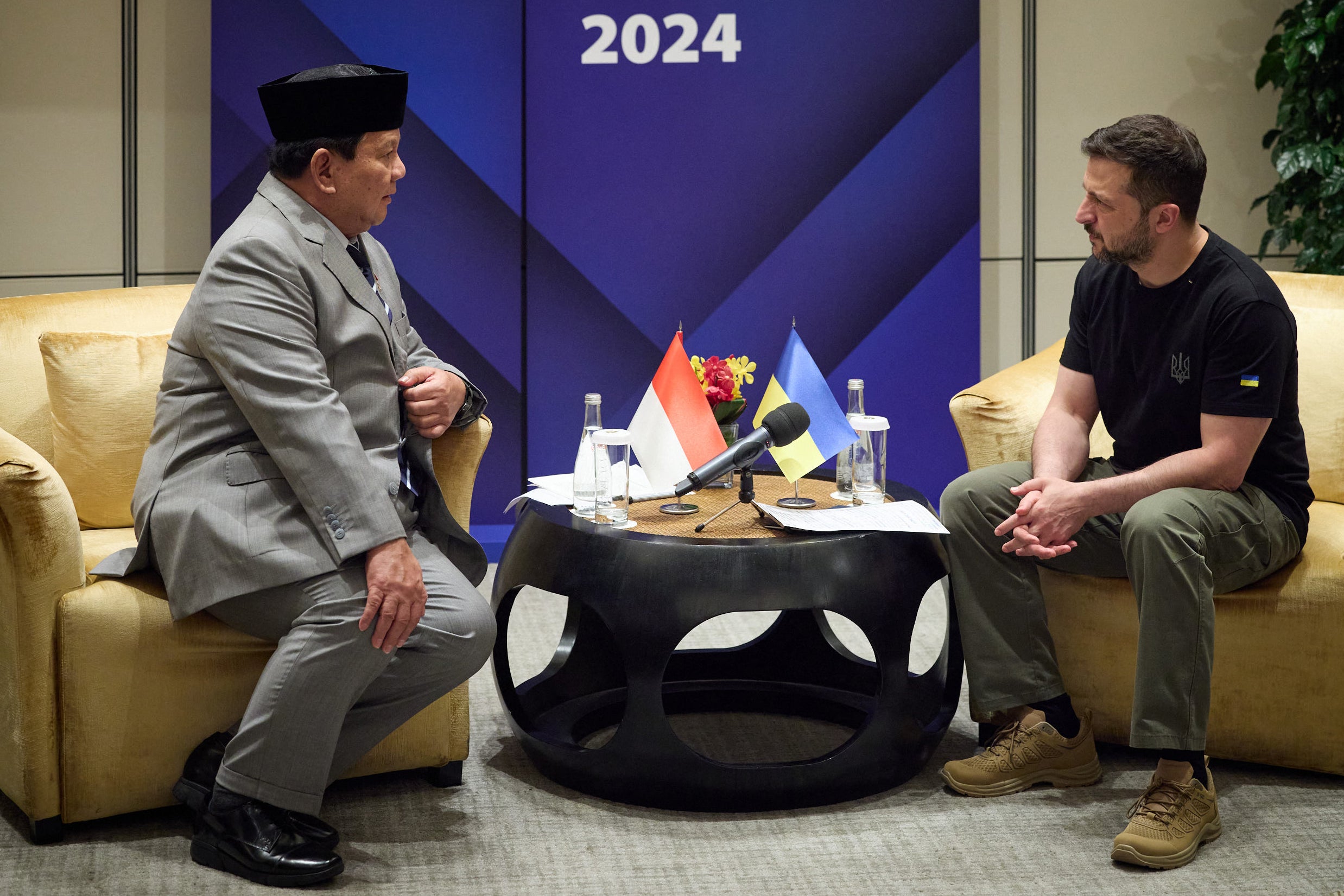 In this handout photograph taken and released by the Ukrainian Presidential Press Service on 1 June 2024, Ukraine's president Volodymyr Zelensky (R) attends a meeting with Indonesia's defence minister and president-elected Prabowo Subianto (L) during Shangri-La Dialogue Summit in Singapore