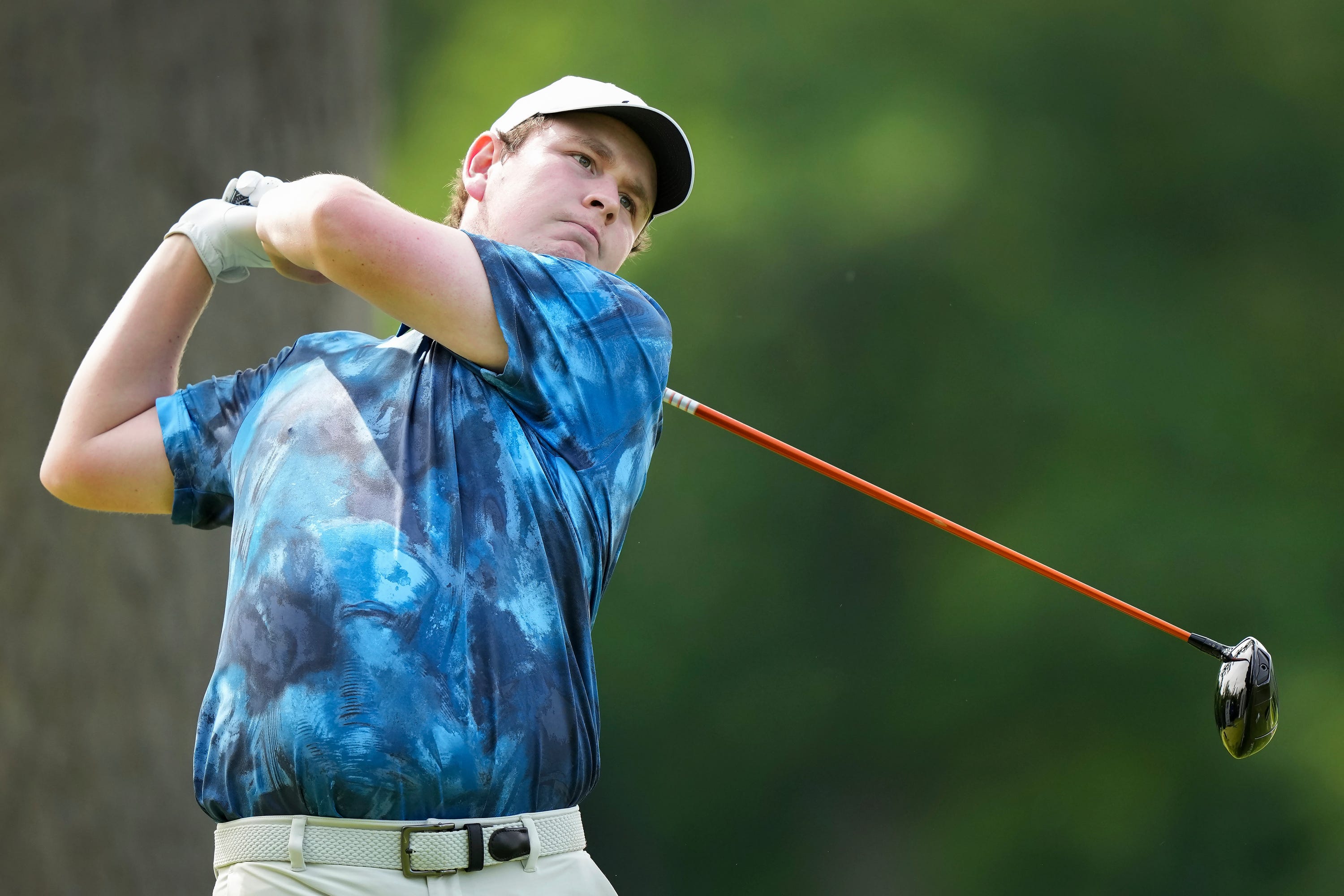 Robert MacIntyre tees off on the fourth hole during the third round of Canadian Open golf tournament in Hamilton (Nathan Denette/The Canadian Press via AP)