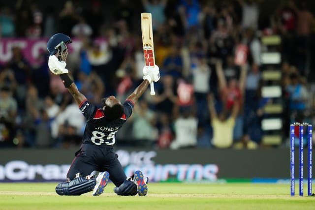 United States’ Aaron Jones reacts after hitting the winning runs during the men’s T20 World Cup cricket match between the United States and Canada (Julio Cortez/AP)