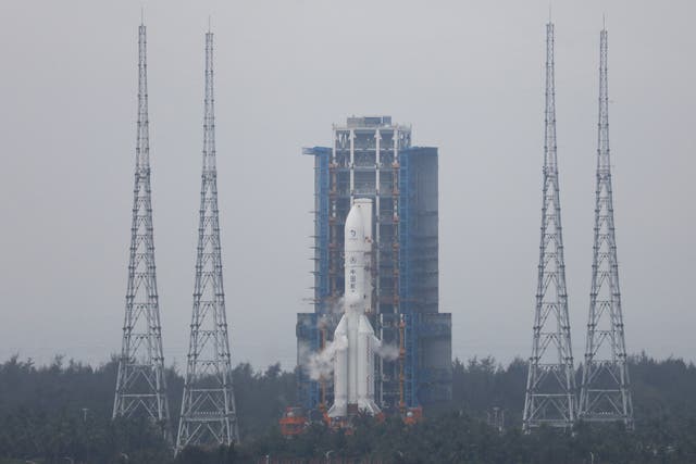<p>The Chang’e 6 lunar probe and the Long March-5 Y8 carrier rocket combination sit atop the launch pad at the Wenchang Space Launch Site in Hainan province, China 3 May 2024</p>
