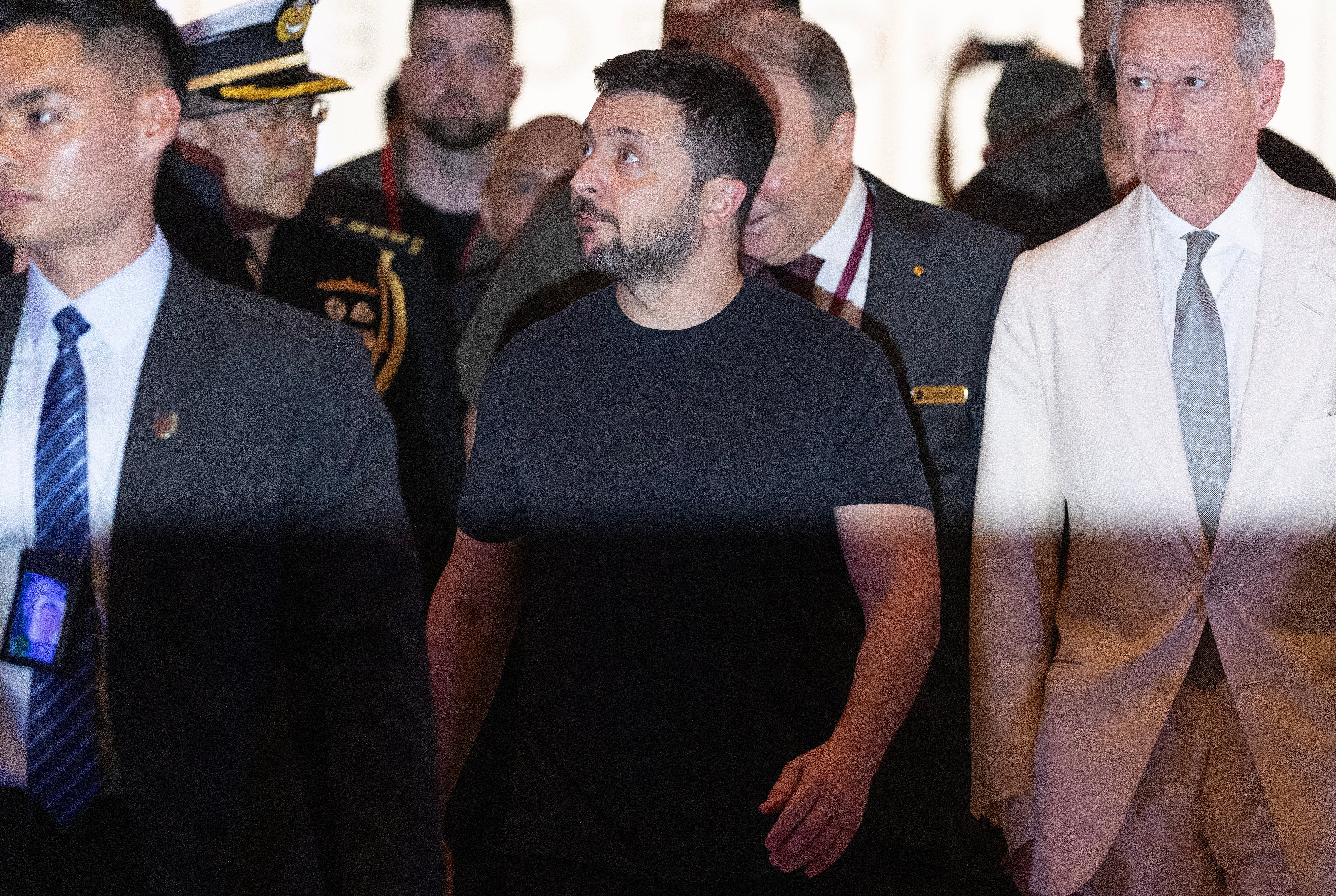 Ukraine president Volodymyr Zelensky is accompanied by Executive Chairman of IISS John Chipman (R) as he arrive at the Shangri-la Hotel to attend the International Institute for Strategic Studies (IISS) 21th Shangri-La Dialogue in Singapore, 01 June 2024