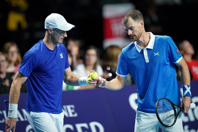 Andy Murray, left, and Jamie Murray hope to team up at Wimbledon (Jane Barlow/PA)