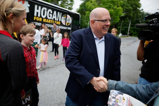 <p>Former Governor Larry Hogan greets supporters on 14 May ahead of the state’s primary elections</p>
