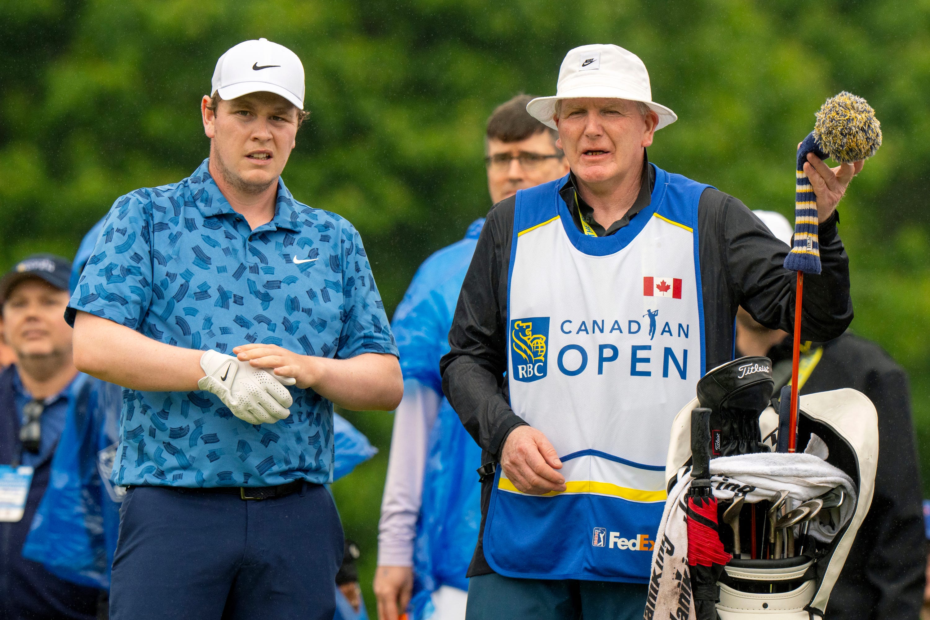 Robert MacIntyre (left) has won the RBC Canadian Open with his father Dougie on the bag (Frank Gunn/The Canadian Press via AP)