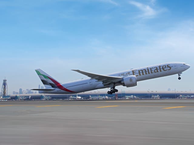 <p>Late planes: Emirates Boeing 777 taking off from Dubai International Airport</p>
