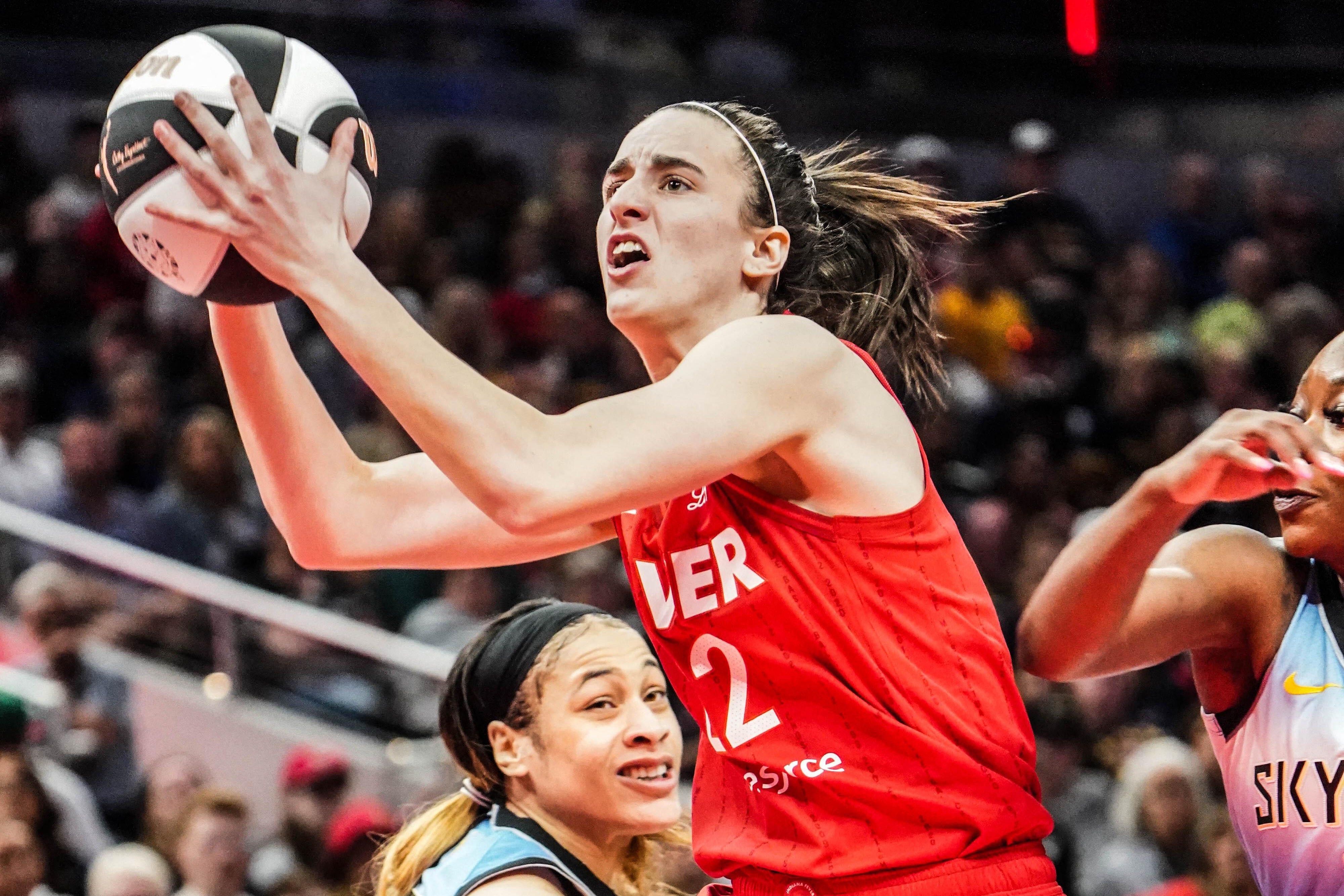 Indiana Fever guard Caitlin Clark drives to the basket against Chicago Sky during a game at Grainbridge Fieldhouse on 1 June 2024