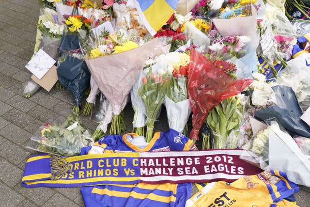 <p>Tributes have been left by fans and friends of Rob Burrow outside Headingley Stadium in Leeds (Danny Lawson/PA)</p>