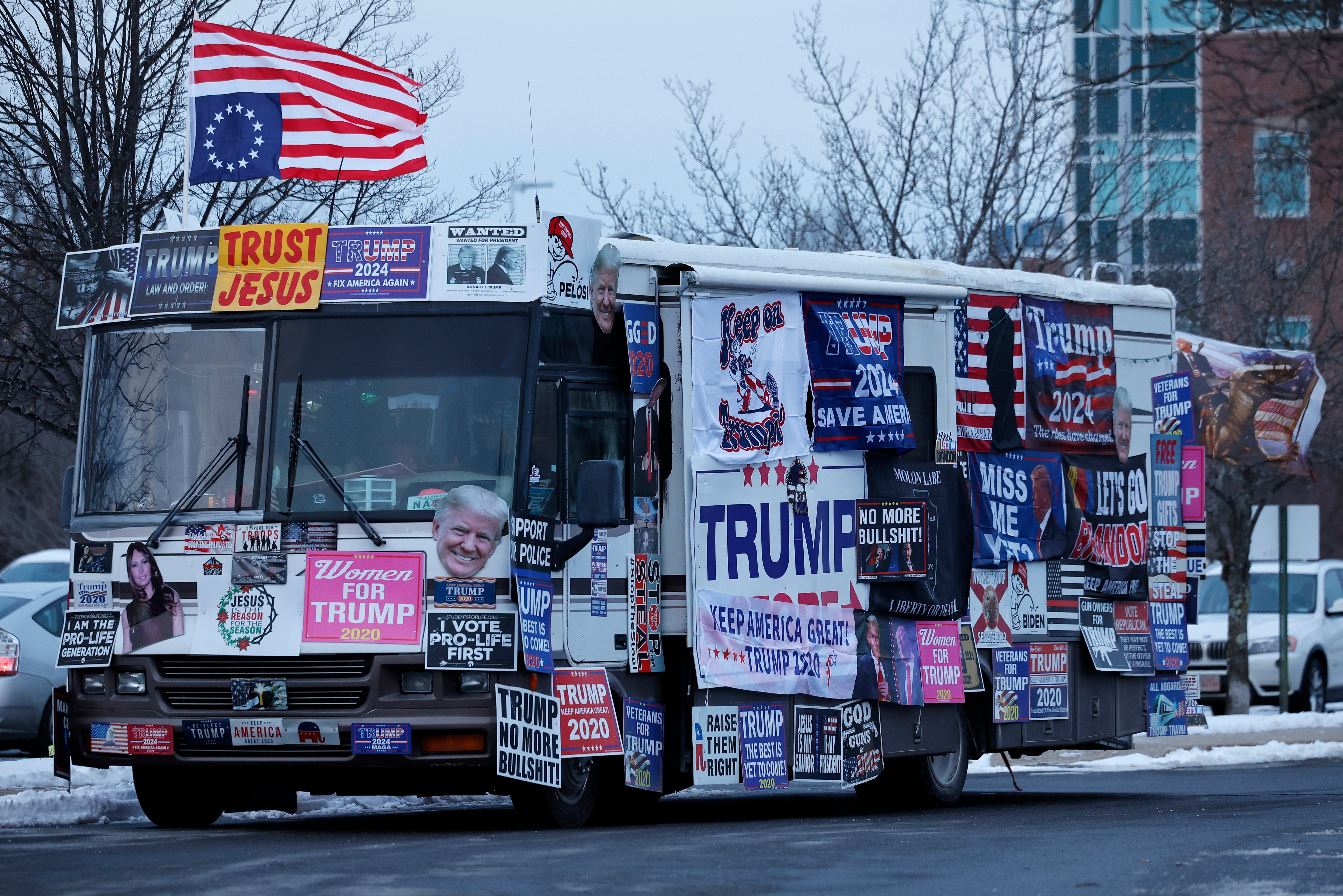 The RV covered in campaign signs and flags has been spotted outside other Donald Trump campaign rallies, such as in Concord, New Hampshire on 19 January