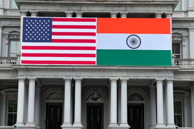 <p>Flags of India and US adorn the Eisenhower Executive Office Building   of the White House</p>