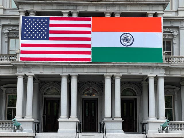 <p>Flags of India and US adorn the Eisenhower Executive Office Building   of the White House</p>